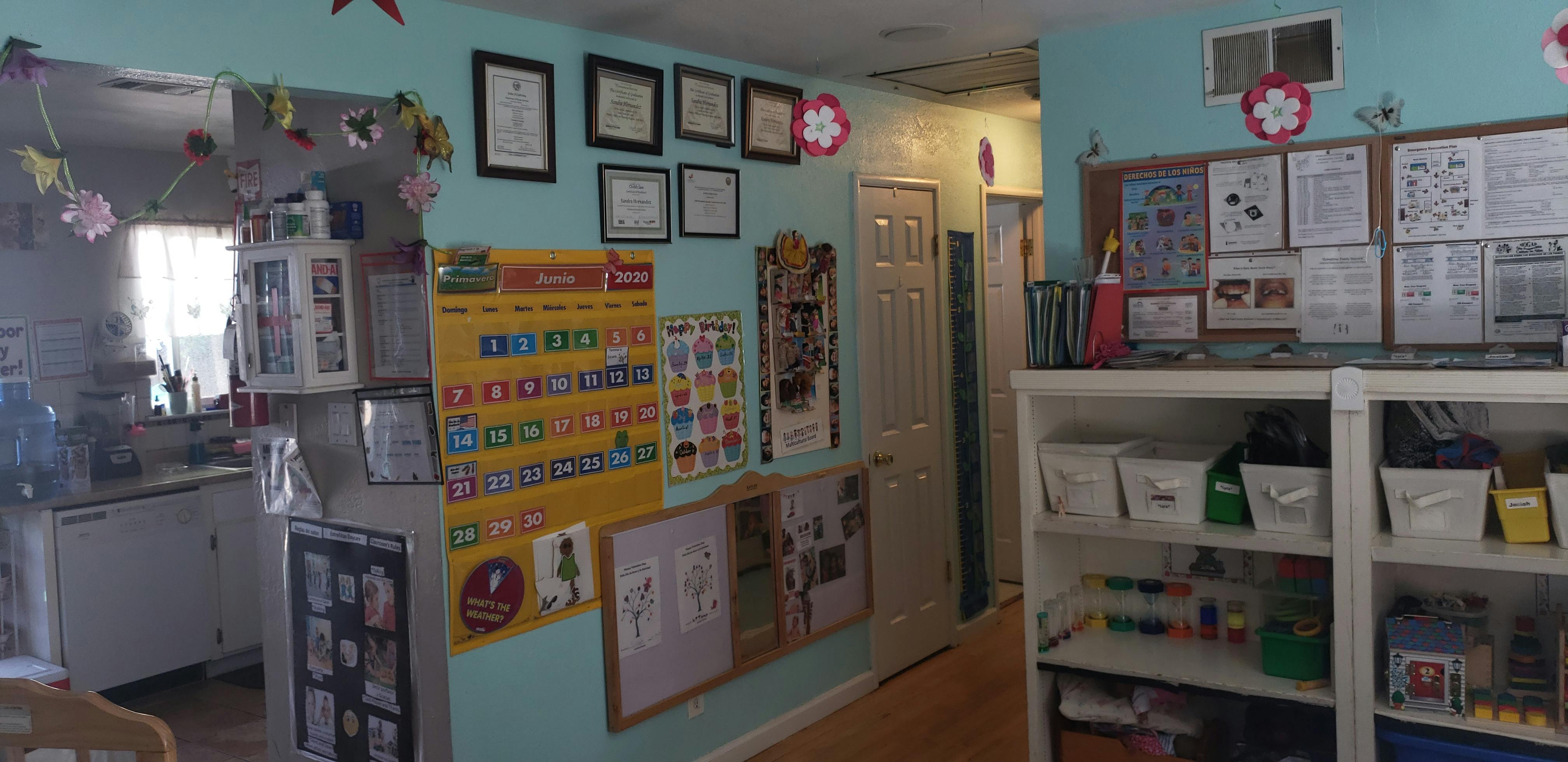 Classroom with educational posters and shelves
