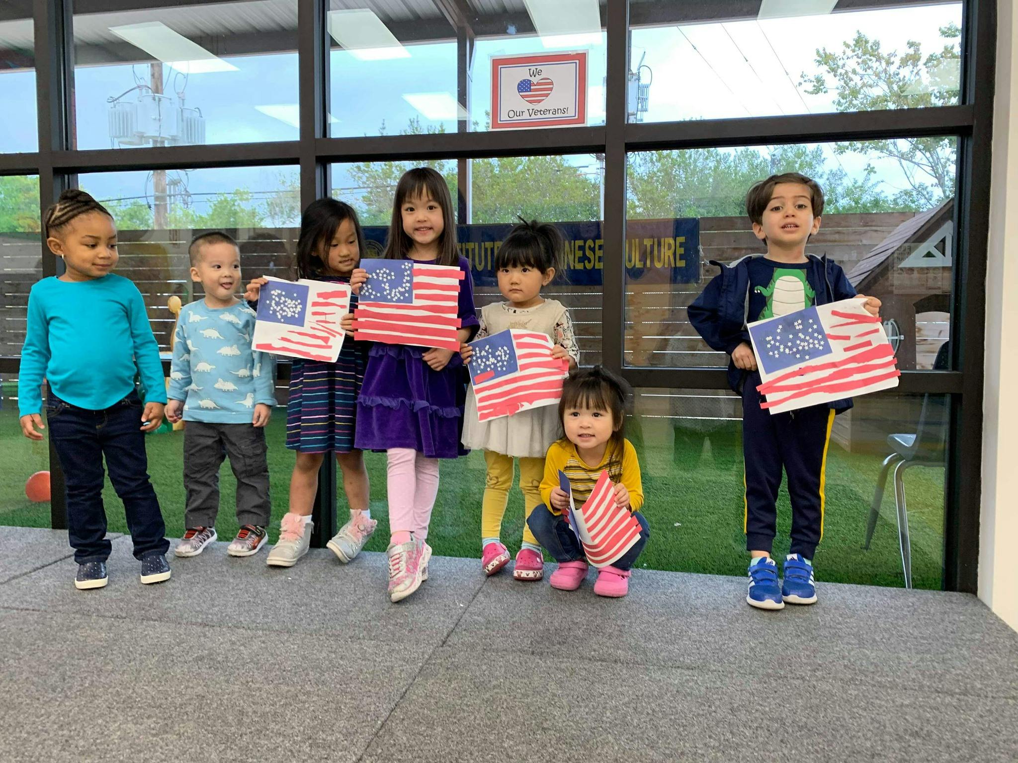 Group of children holding American flags