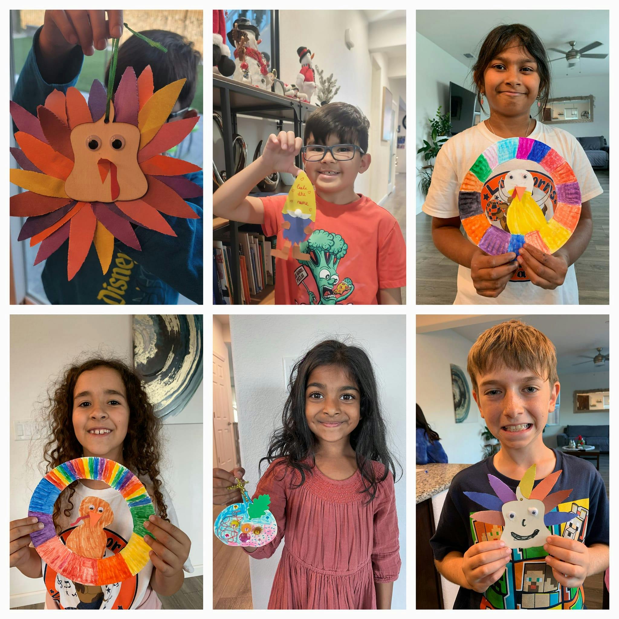 Six children holding up various colorful crafts