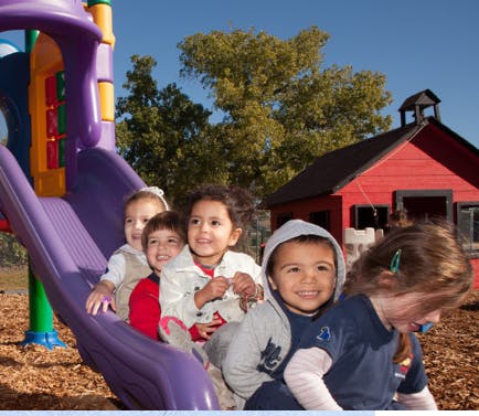 Children on a playground slide
