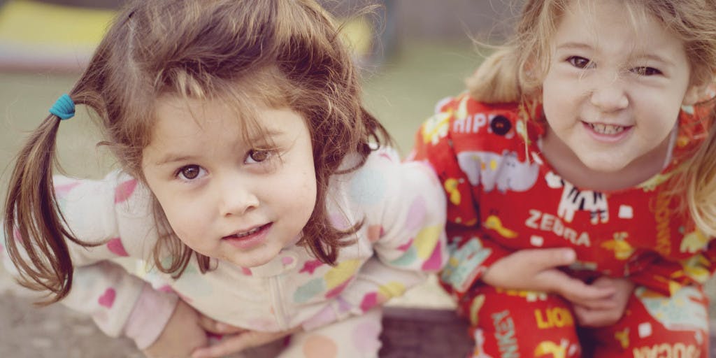 Two children looking up