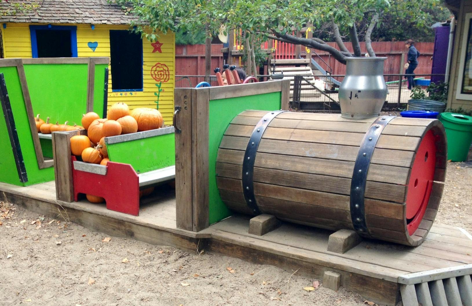 Playground train with pumpkins in the cars