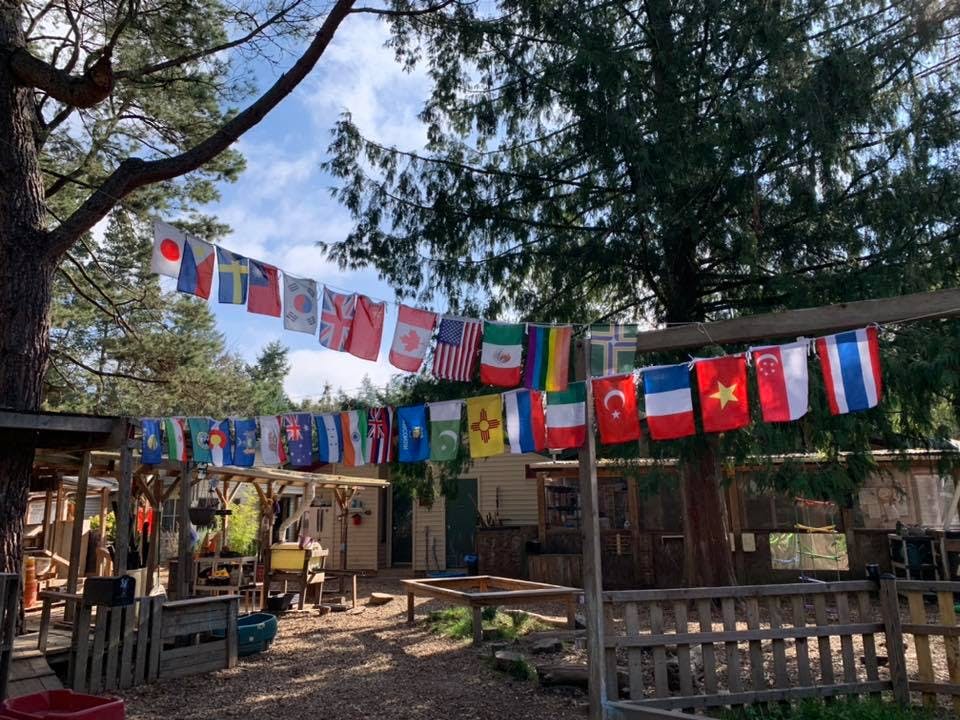 International flags strung across an outdoor area