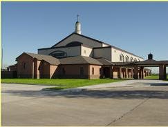 Large building with a steeple and covered walkways