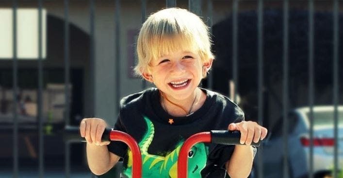 Child on a tricycle