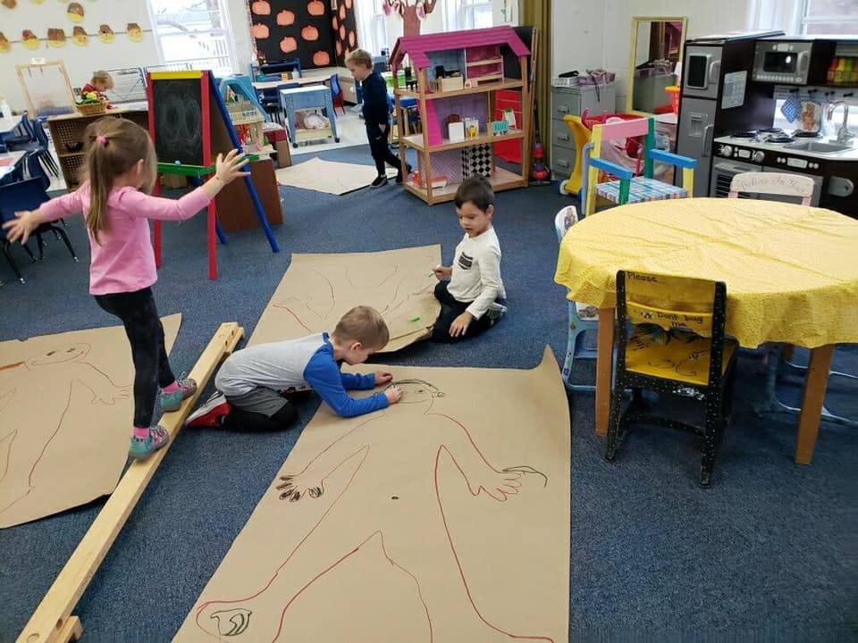 Children playing in a classroom