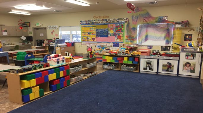 Classroom with colorful storage units and toys