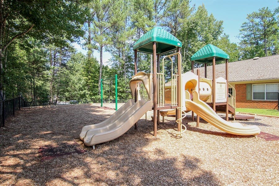 Playground with slides and climbing structures