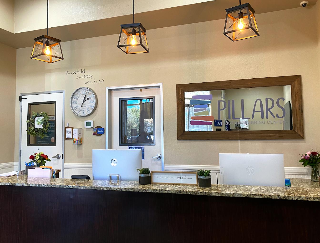 Reception desk and front office of The Pillars Christian Learning Center