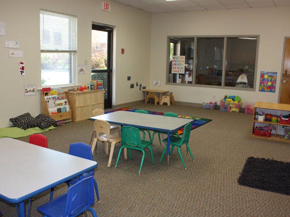 Classroom with small tables and chairs