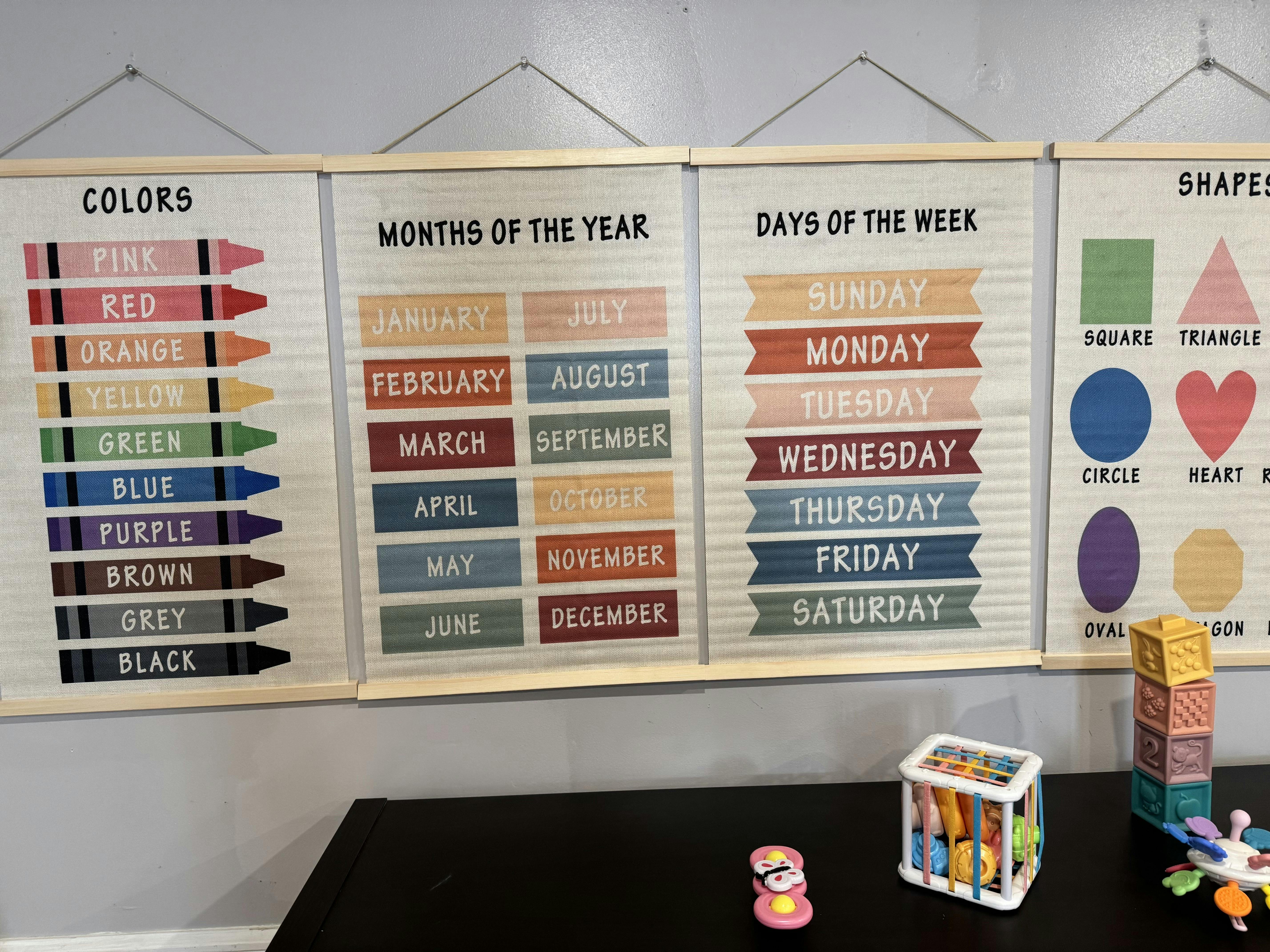 Educational charts for colors, months, days of the week, and shapes