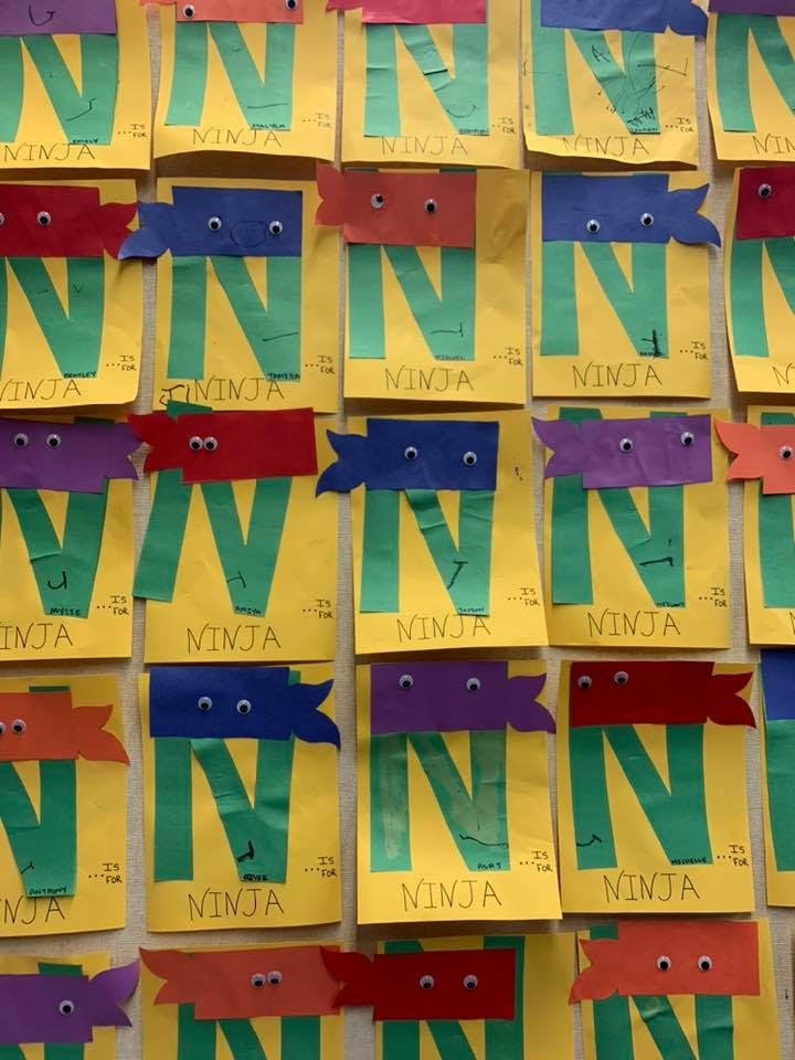 Crafts of the letter N with ninja masks and googly eyes