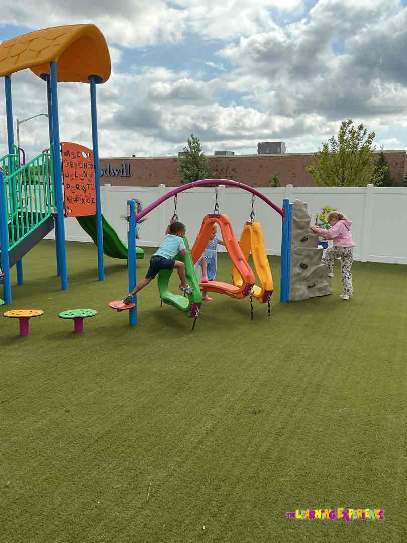 Children playing on playground equipment
