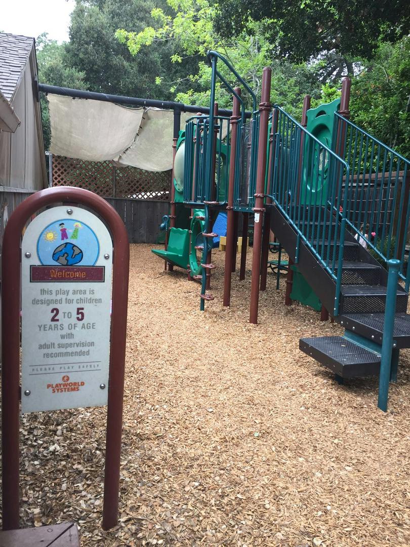 Playground with a sign that reads "2 to 5 years of age"