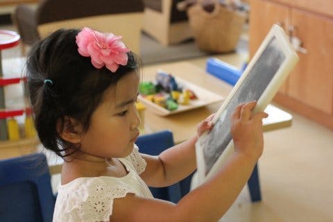 Child holding a book
