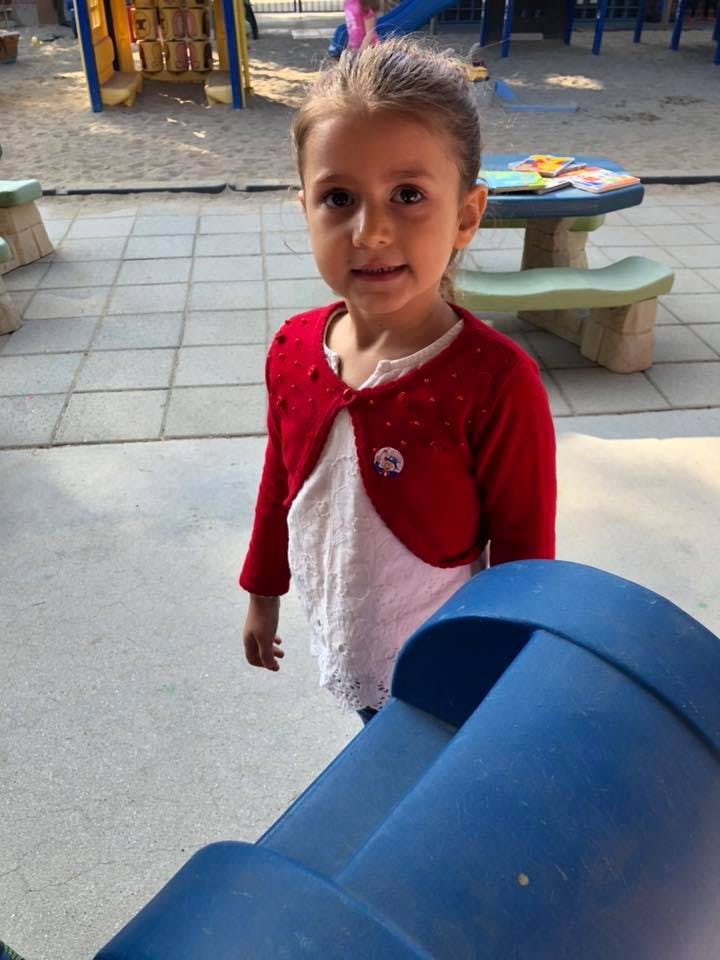 Child standing on a playground