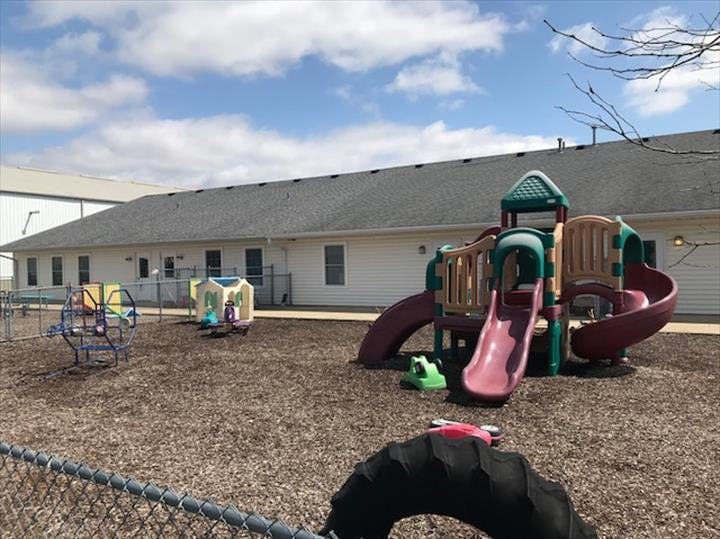 Playground with slides and other equipment on wood chips