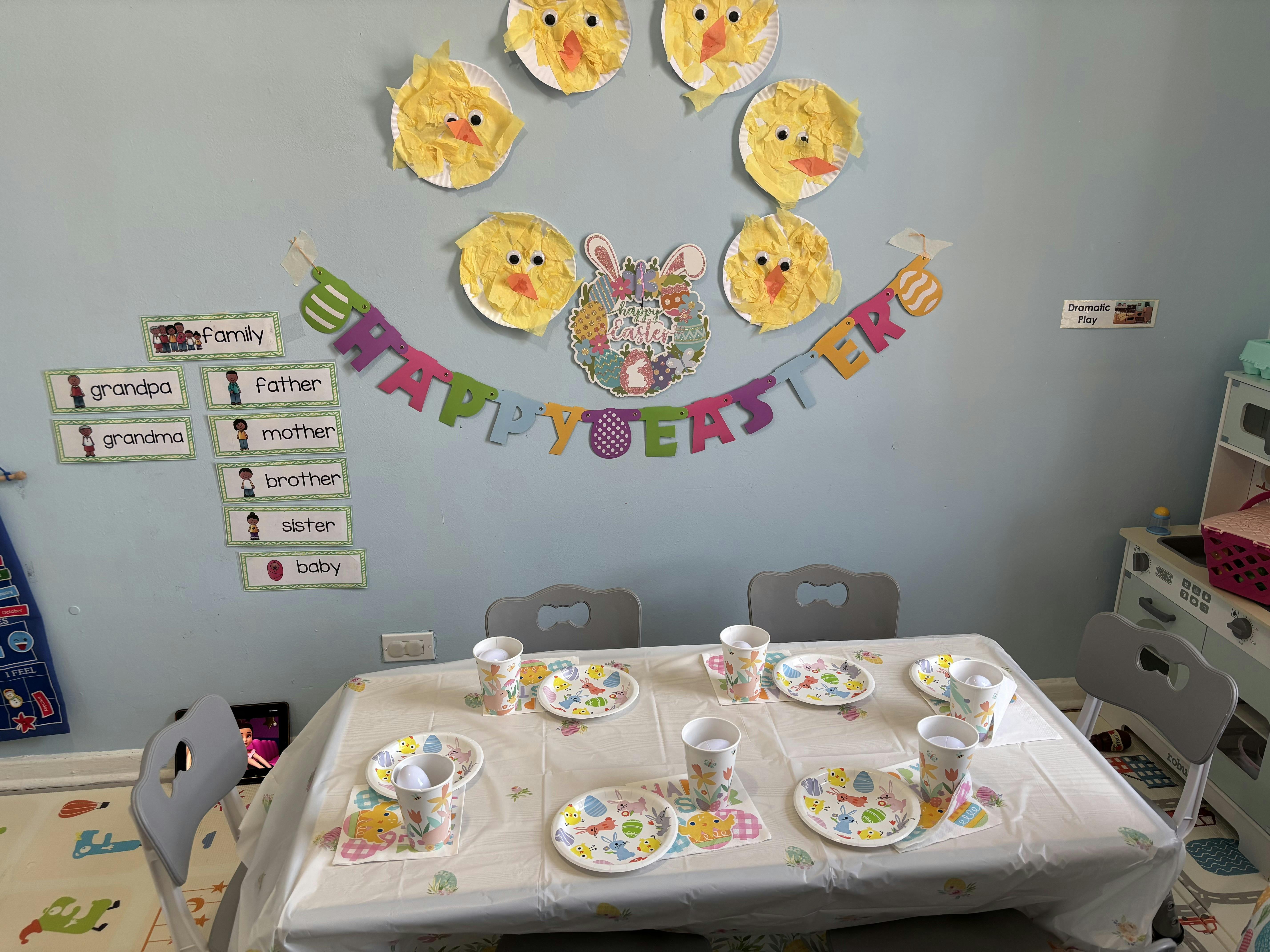 Easter decorations and a table set for a meal in a classroom