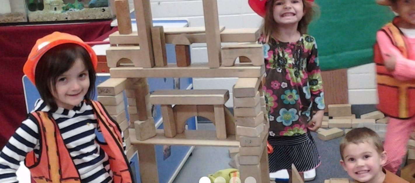 Children playing with wooden blocks