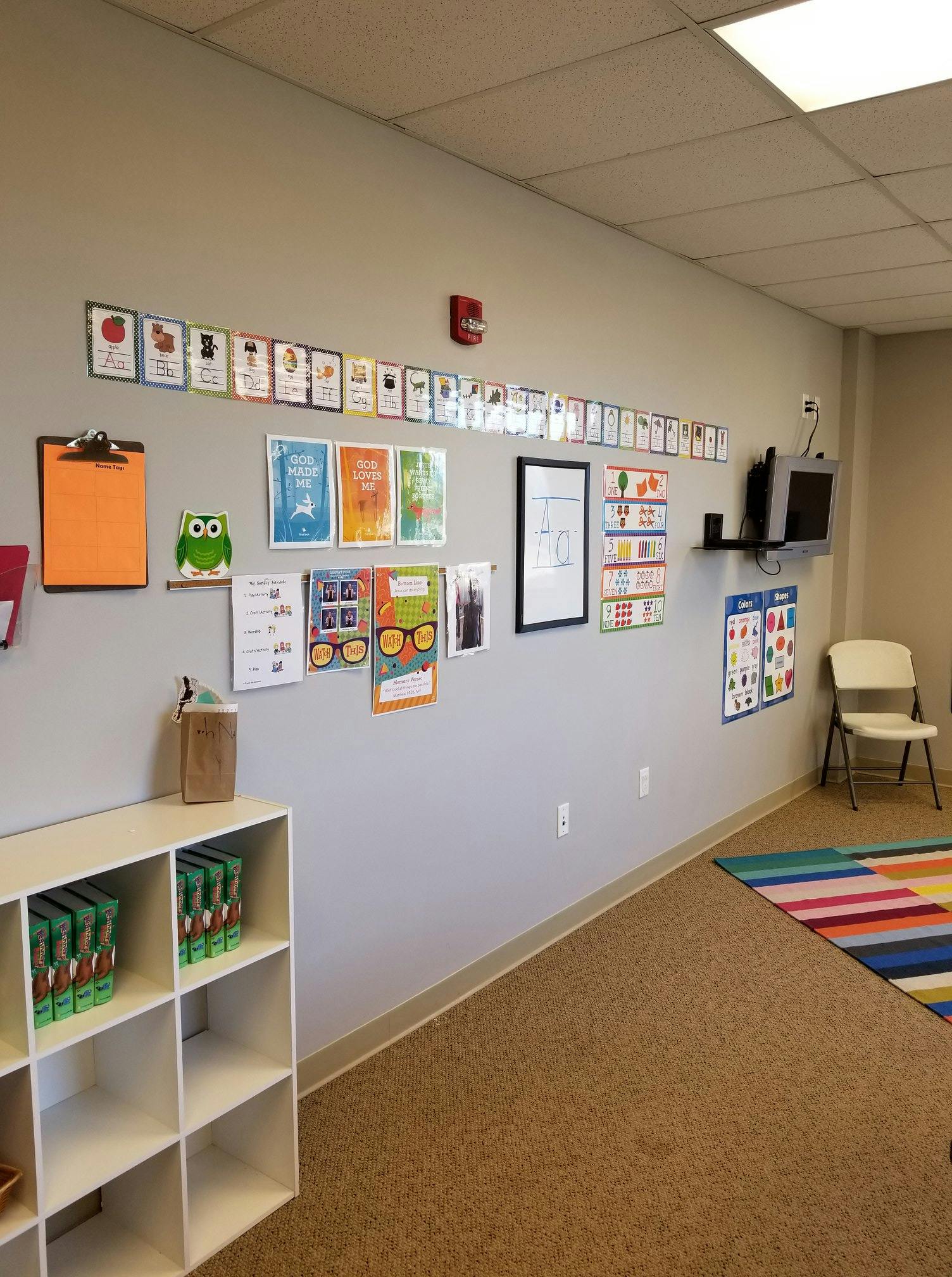 Classroom wall with educational posters and charts