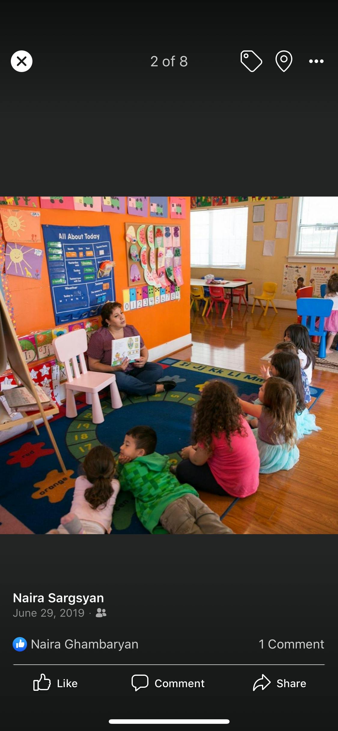 Person reading to children in a classroom