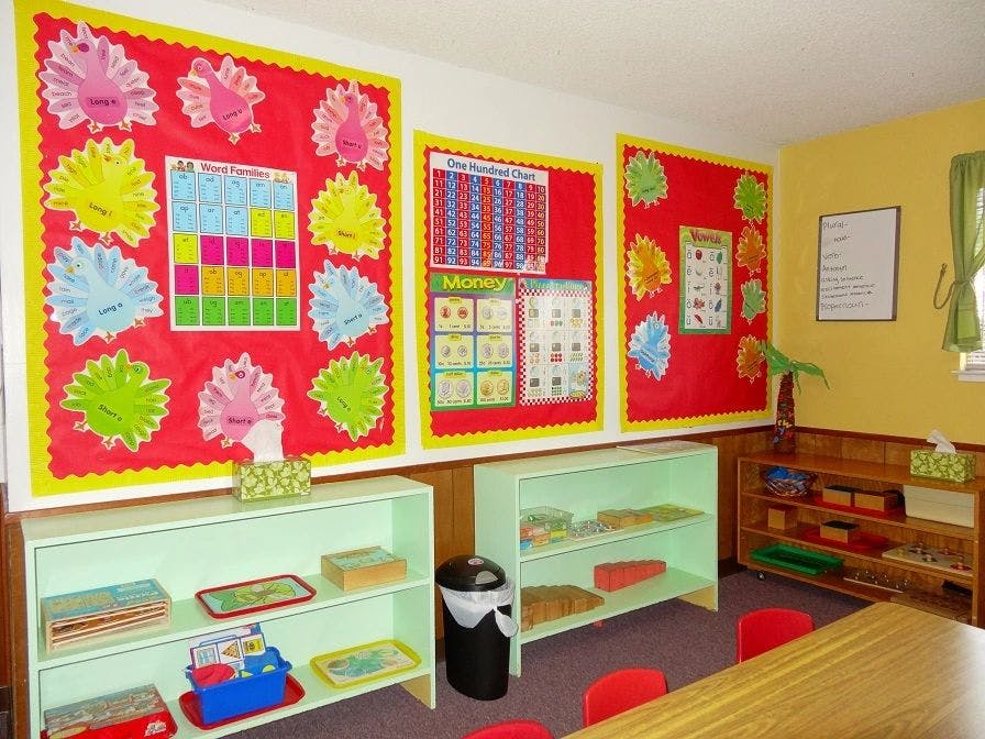 Classroom with bulletin boards and shelves