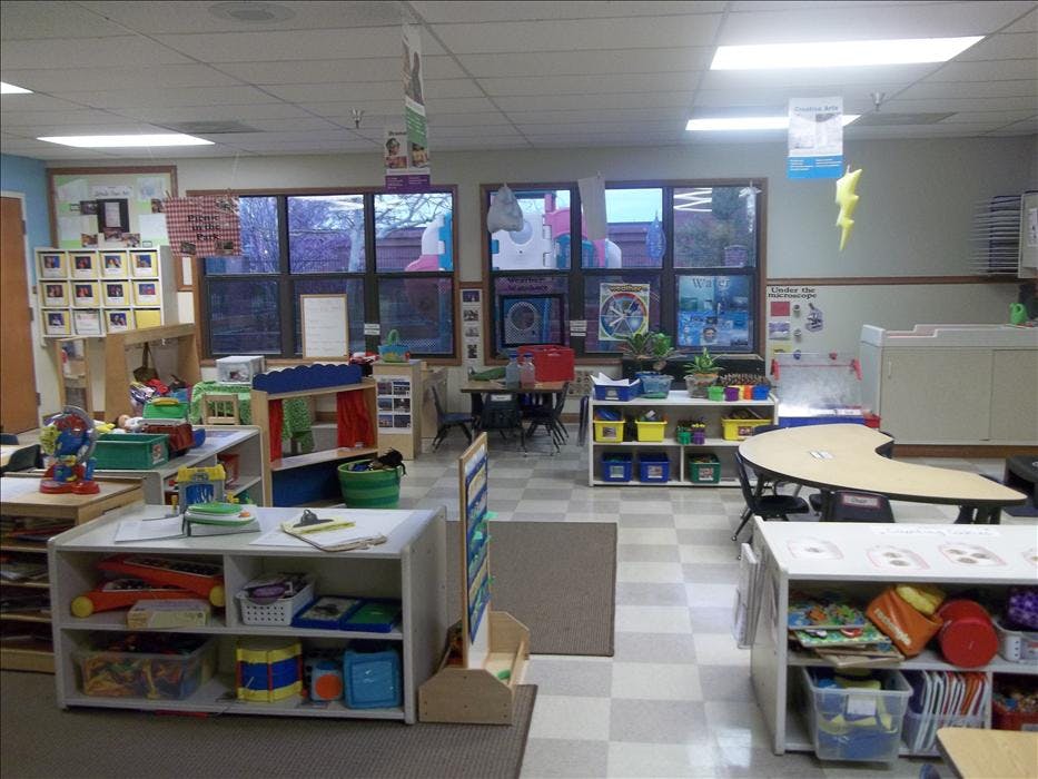 Classroom with child-sized furniture and learning materials