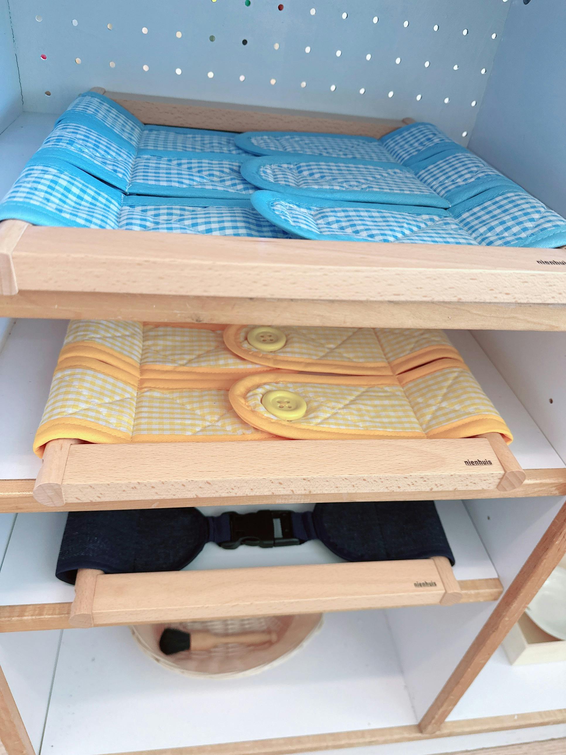 Dressing frames with fabric for practicing buttoning and buckling skills