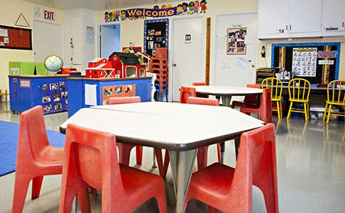 Classroom with small tables and chairs