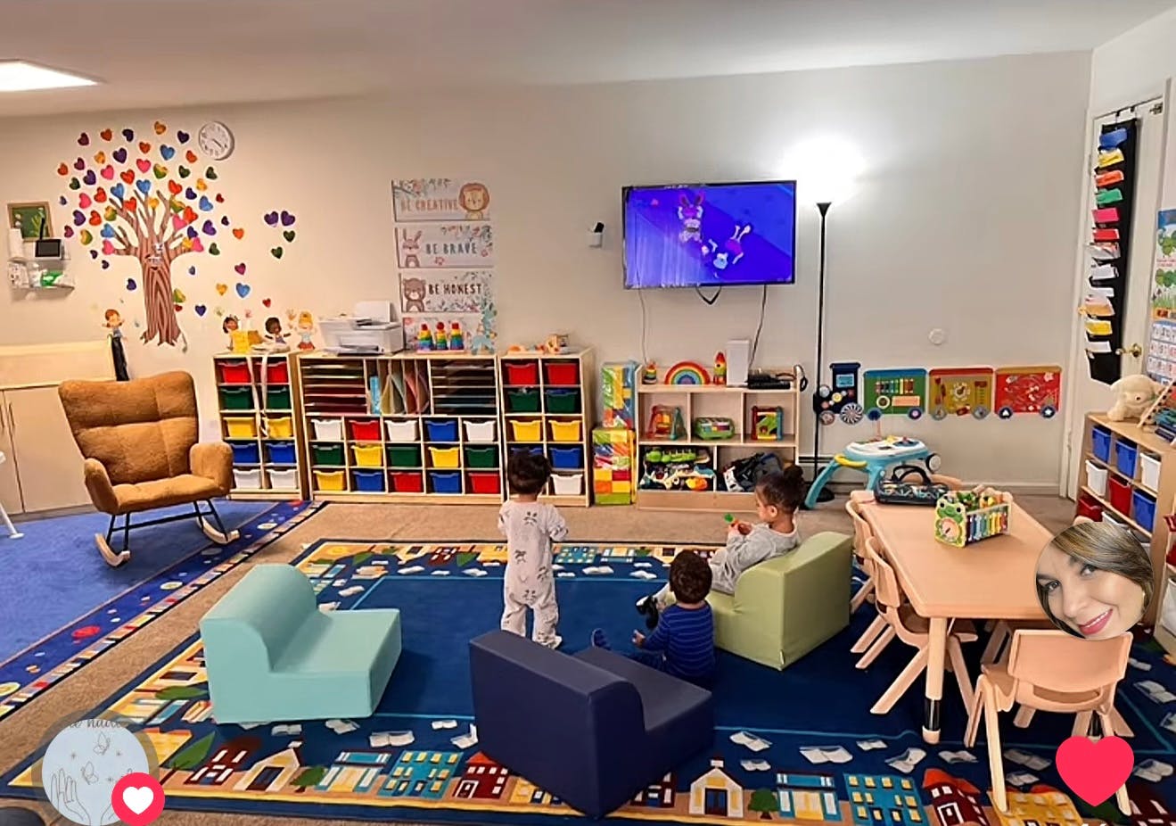 three children playing on a rug in a brightly lit room