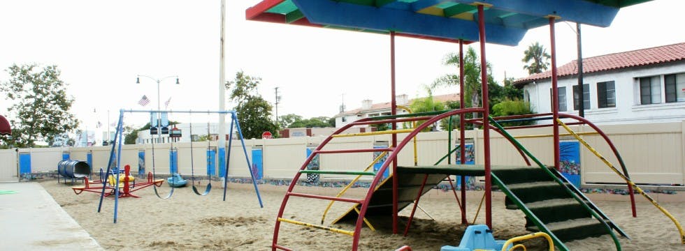 Playground with swings and a climbing structure