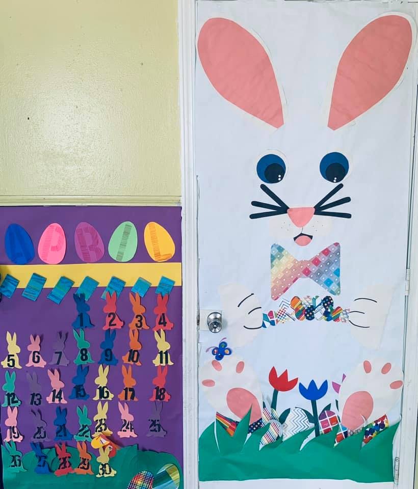 Door decorated as a bunny with a numbered calendar next to it