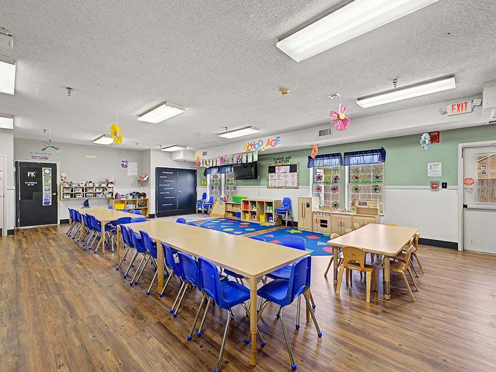 Classroom with child-sized tables and chairs