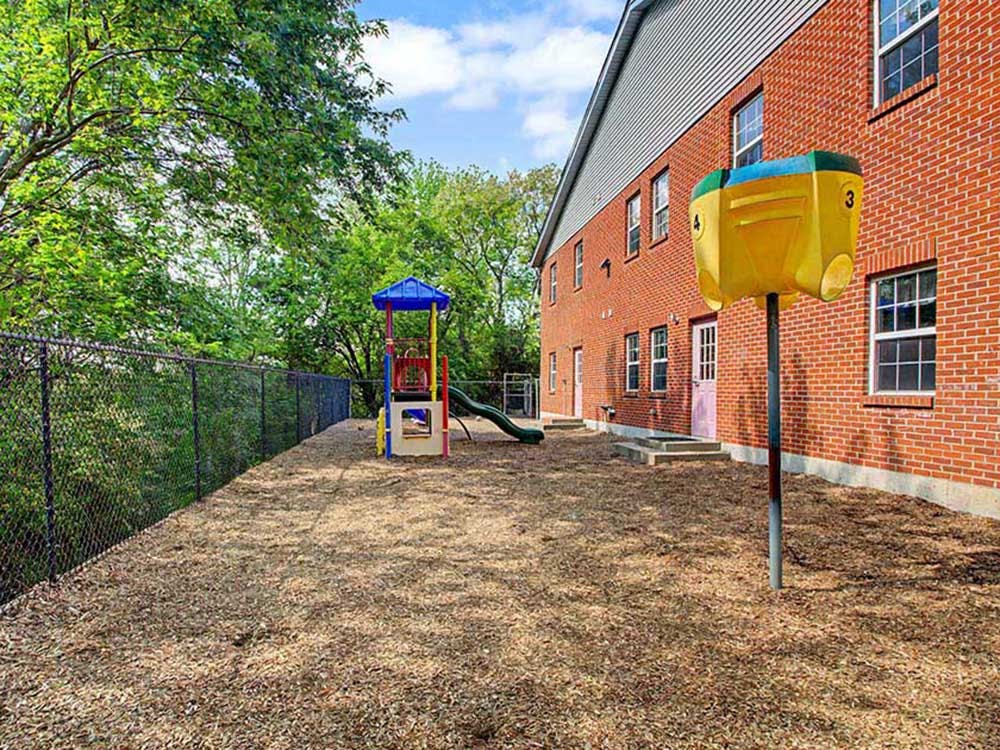 Playground with swings, slides, and monkey bars