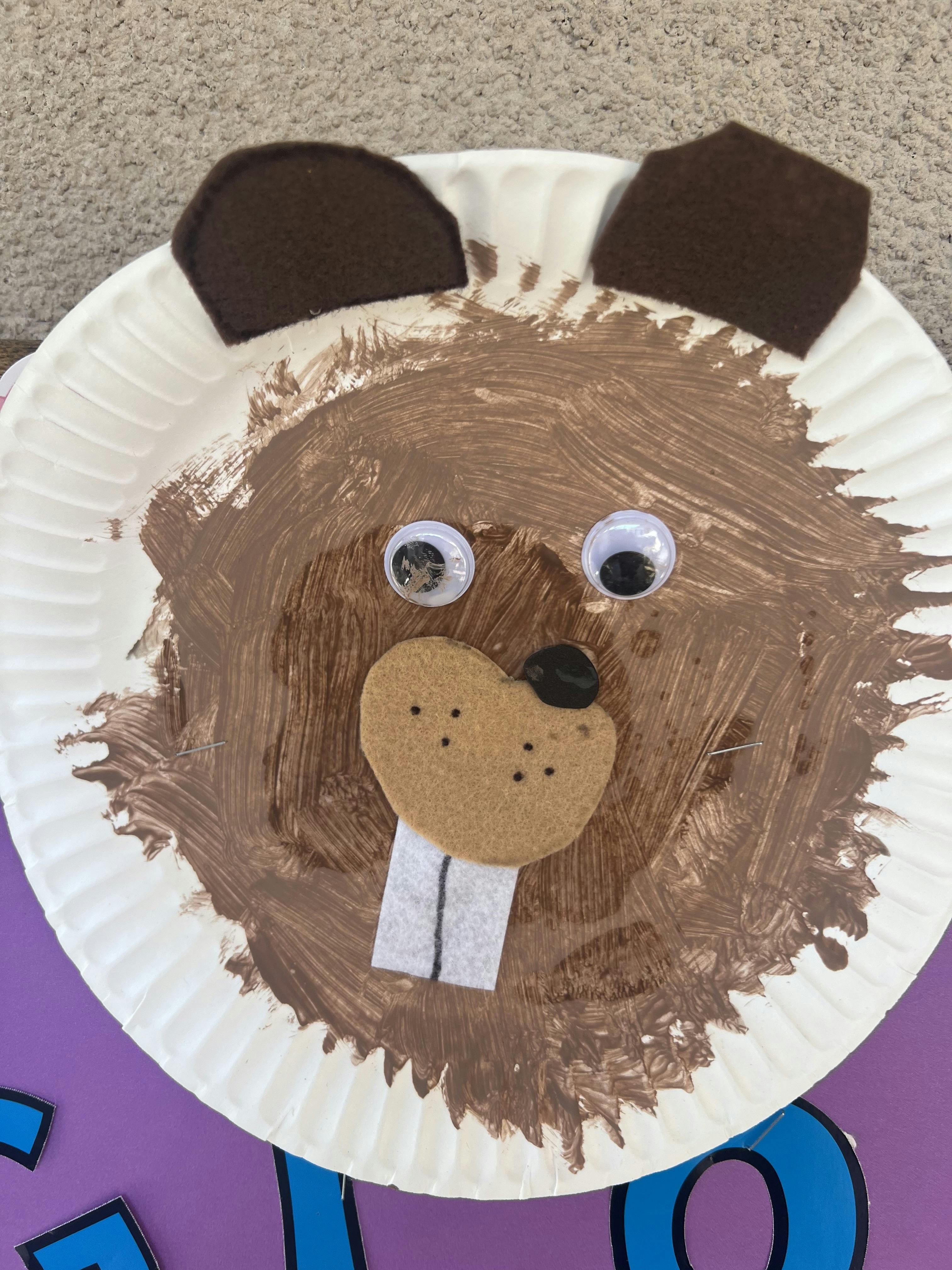 Paper plate craft shaped like a beaver face