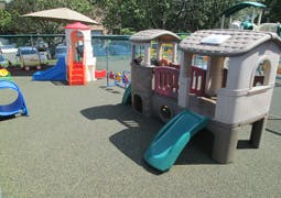 Playground with multiple play structures and slides