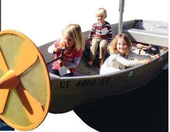 Three children in a boat