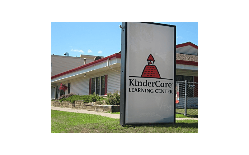 Sign for KinderCare Learning Center in front of building