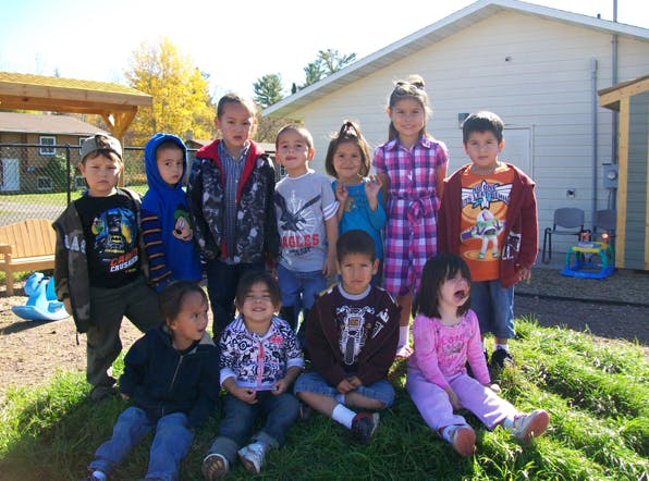 Group of children posing outdoors