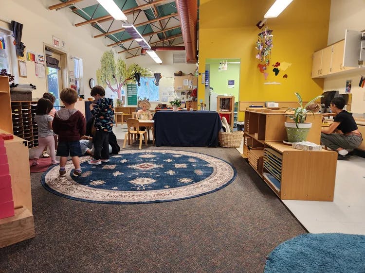 Children and a person in a classroom