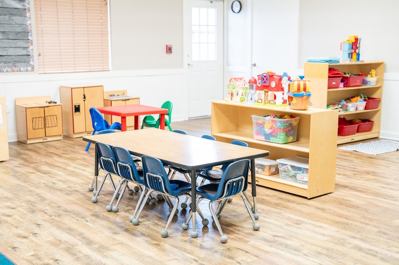 Classroom interior with small tables and chairs for children