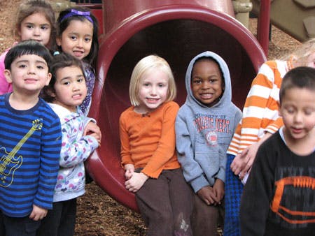 Group of children on a playground slide