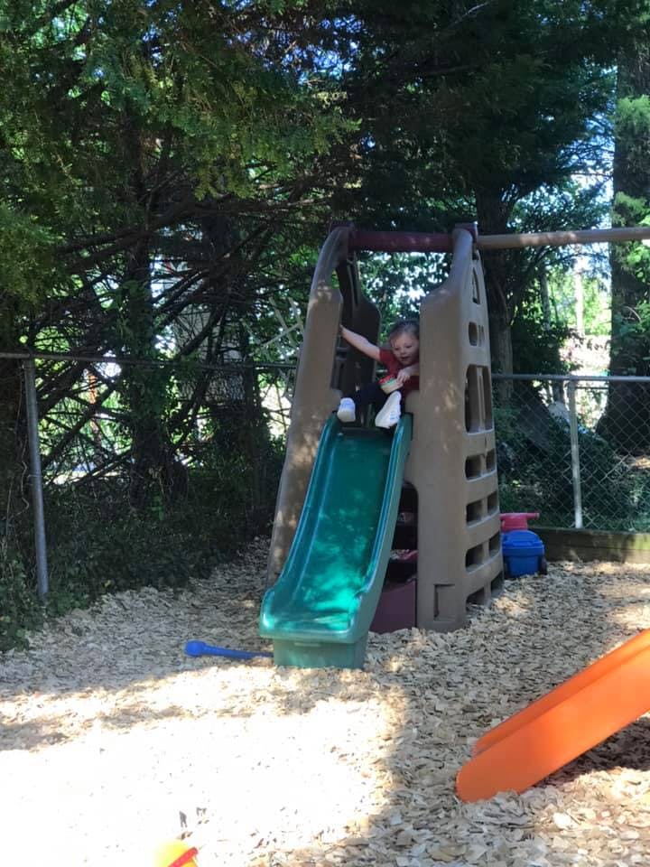 Child on a playground slide