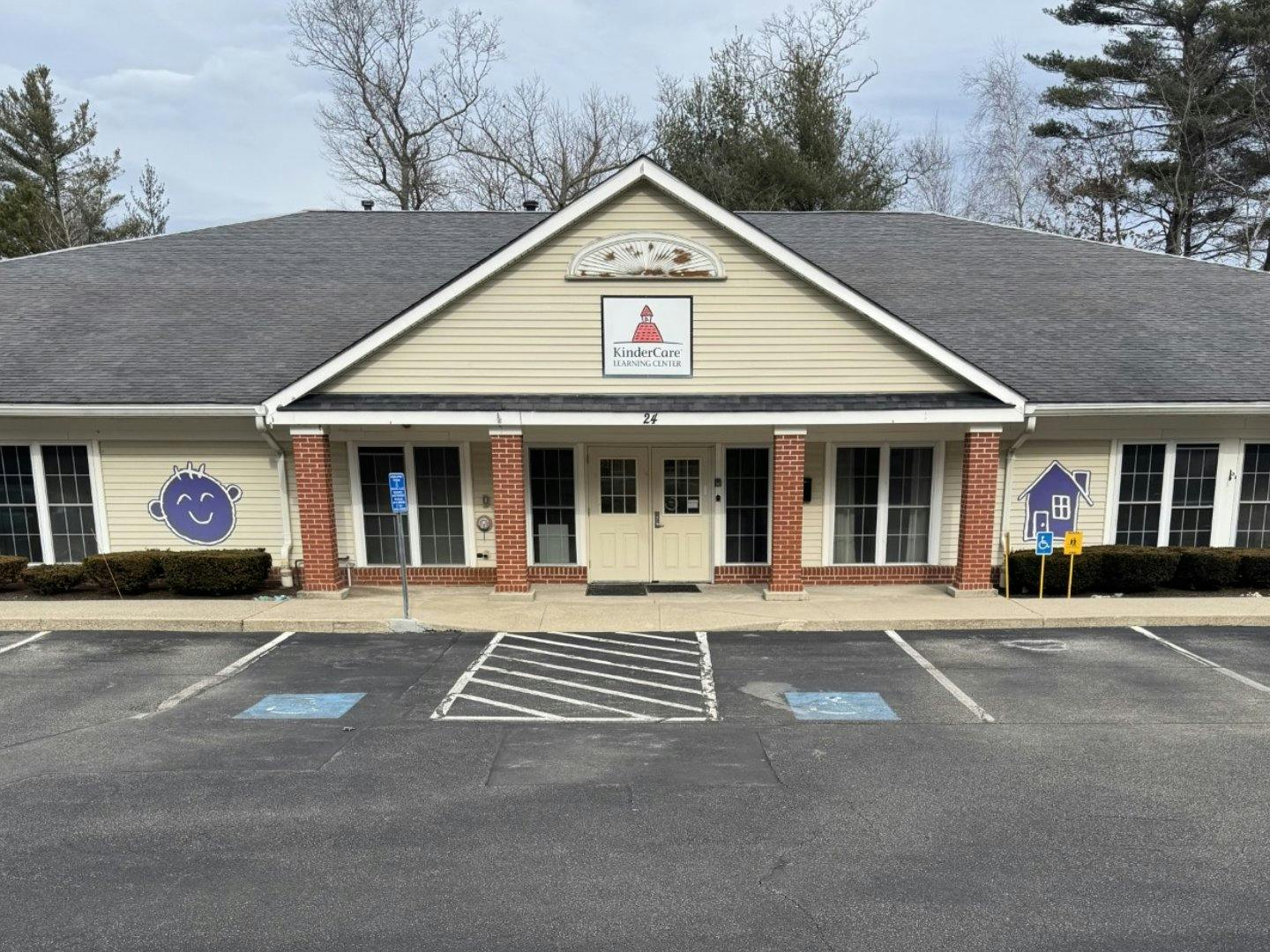 KinderCare Learning Center building with parking lot in front