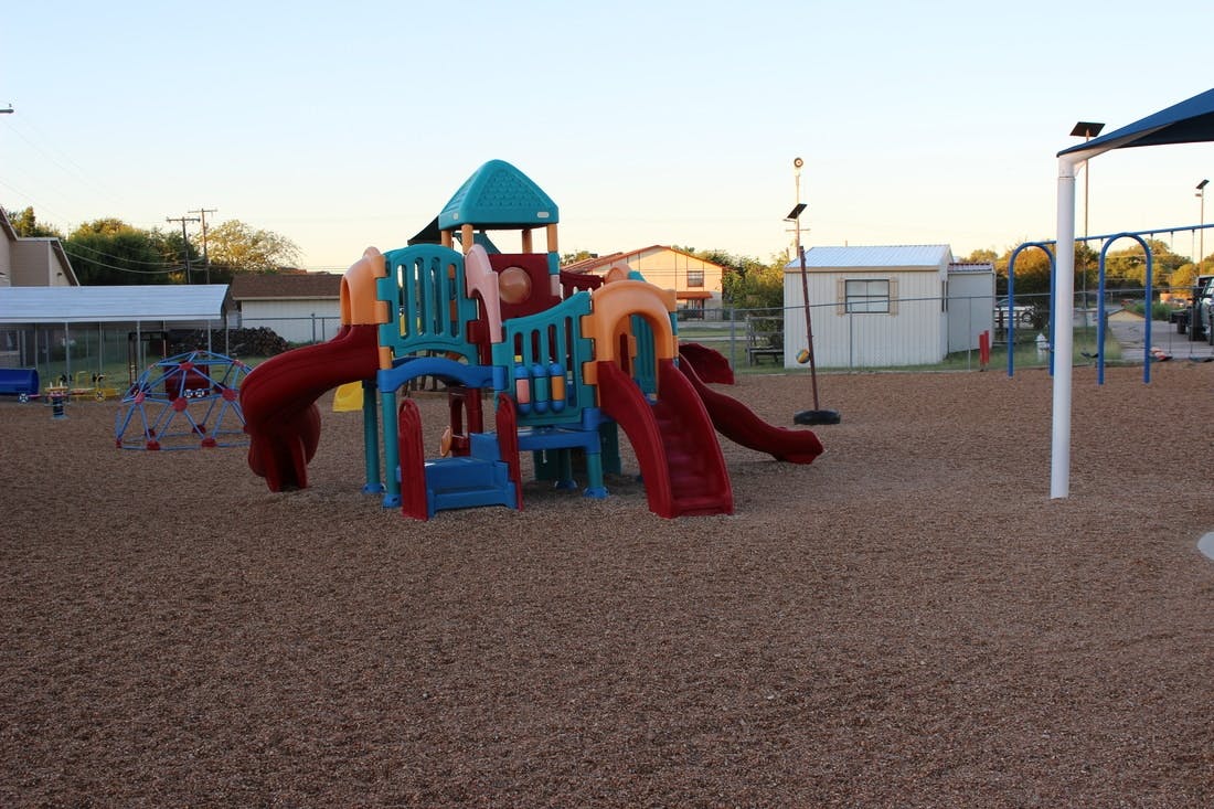 Playground with slides and climbing structures