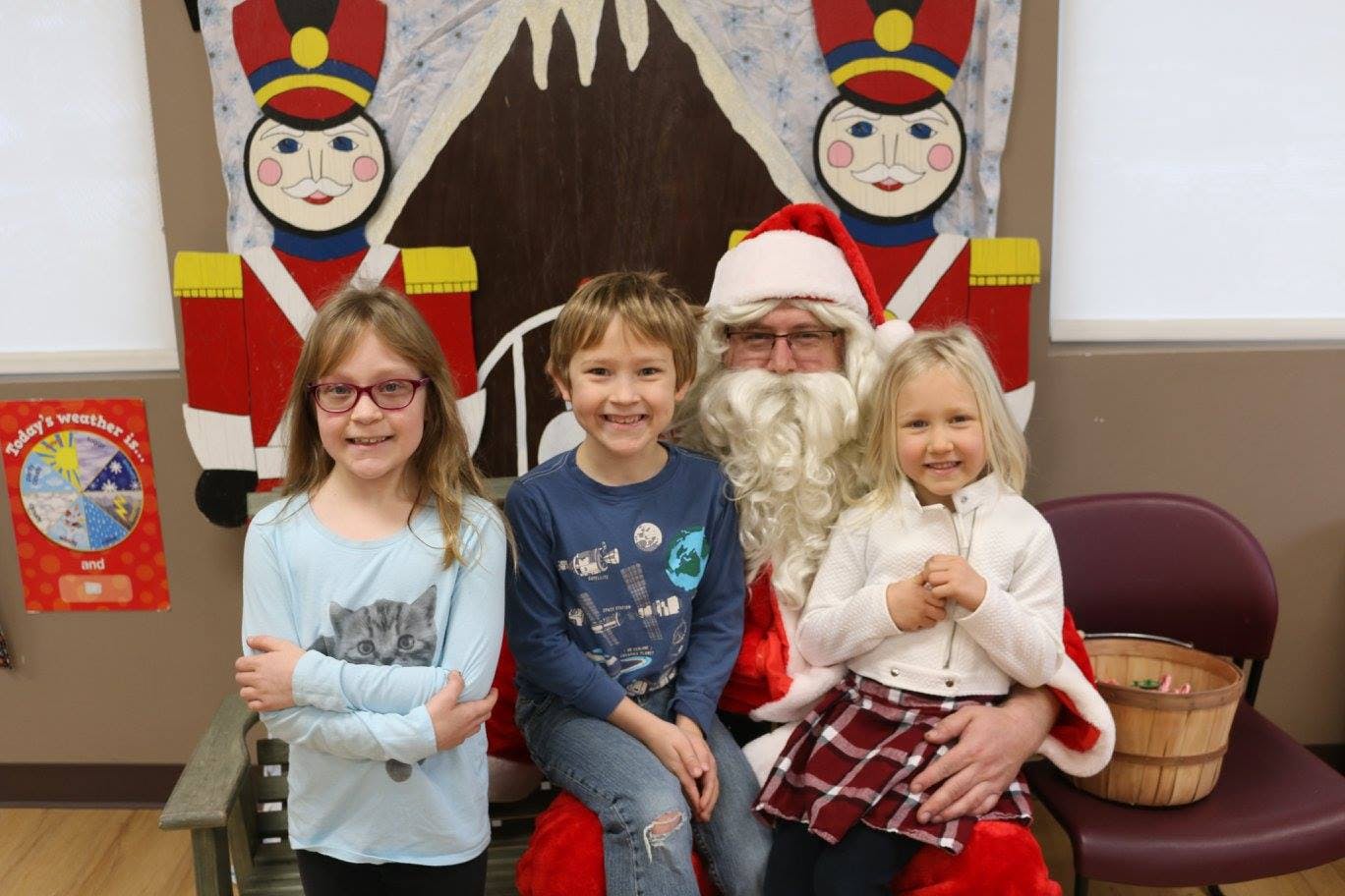 Santa Claus with three children