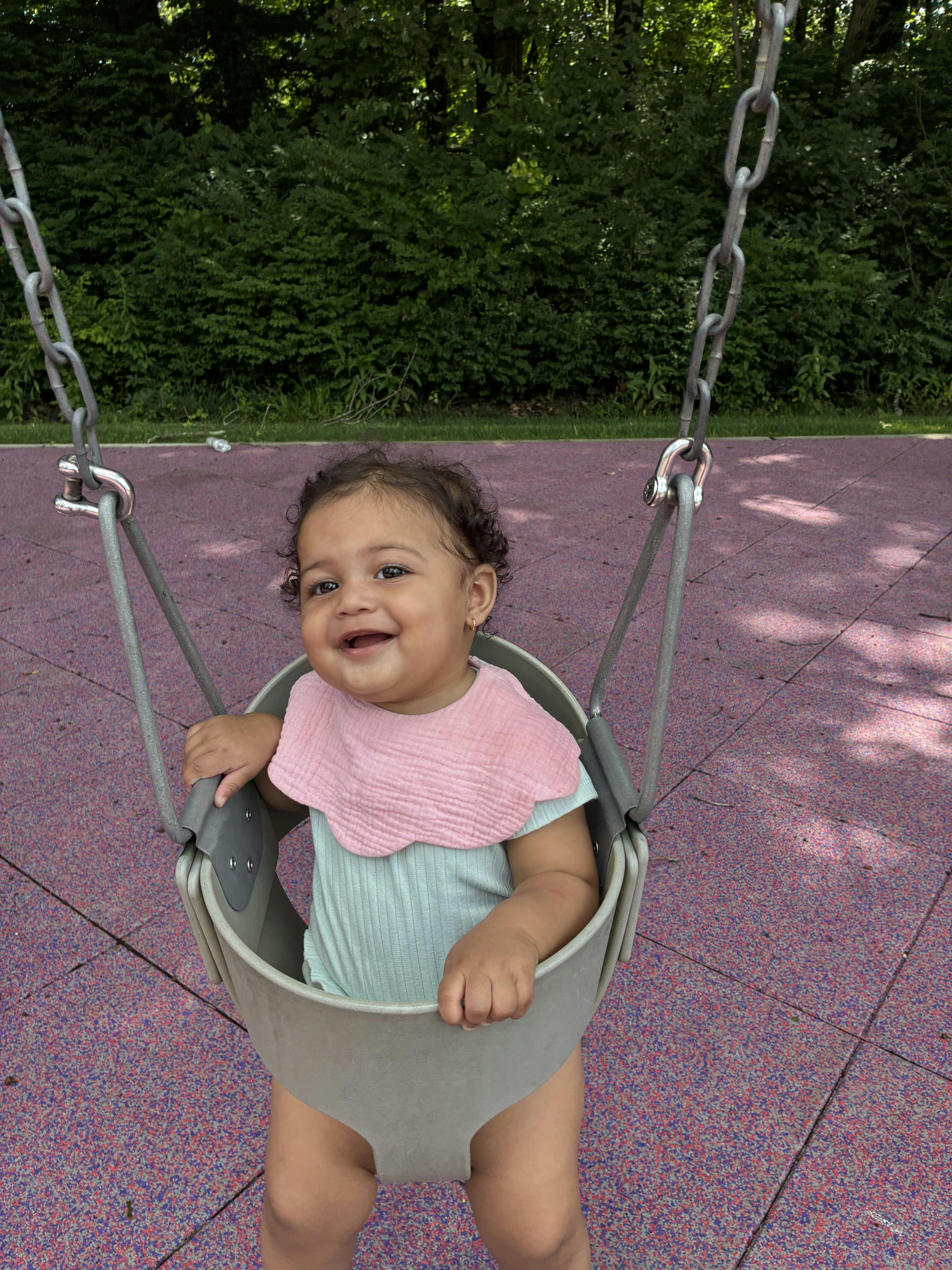 Child in a swing at a playground