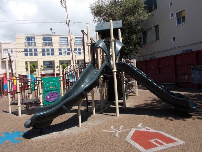 Playground with slides and climbing structures