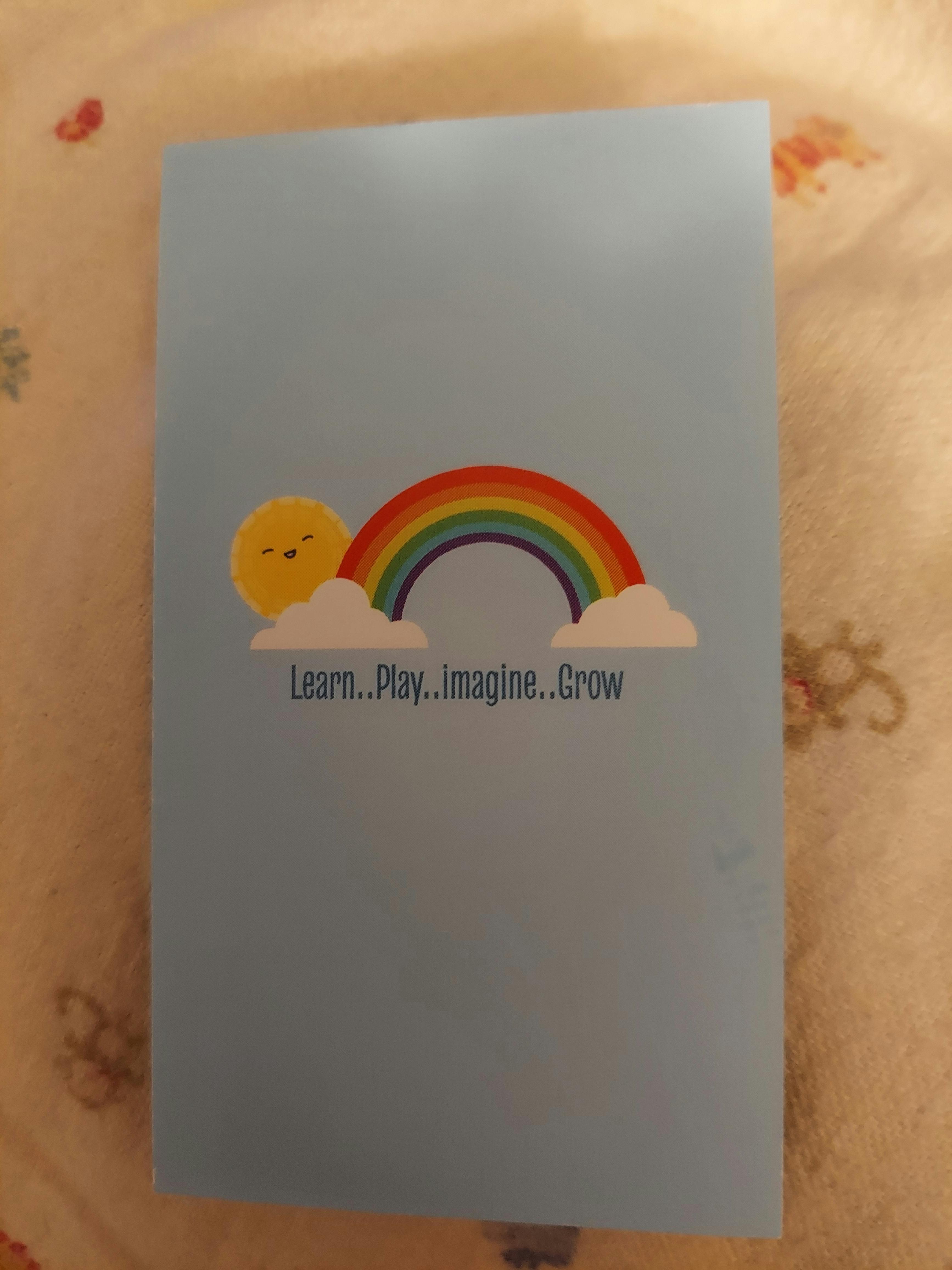 Blue card with a rainbow, sun, clouds, and text "Learn..Play..imagine..Grow"