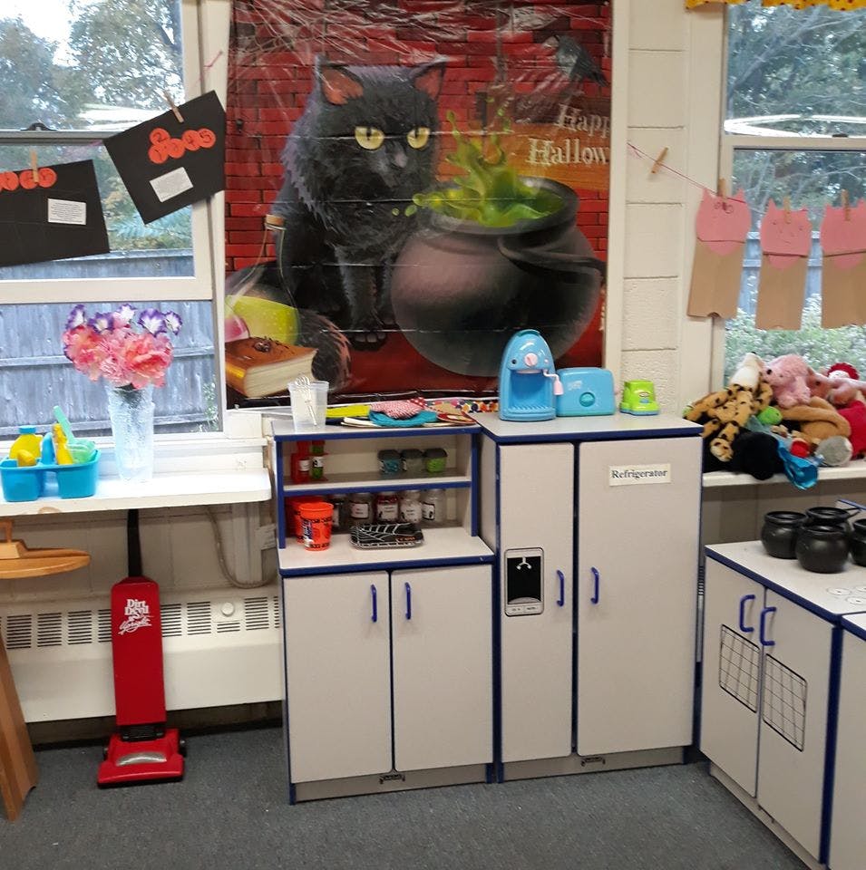 Classroom with play kitchen and Halloween decoration